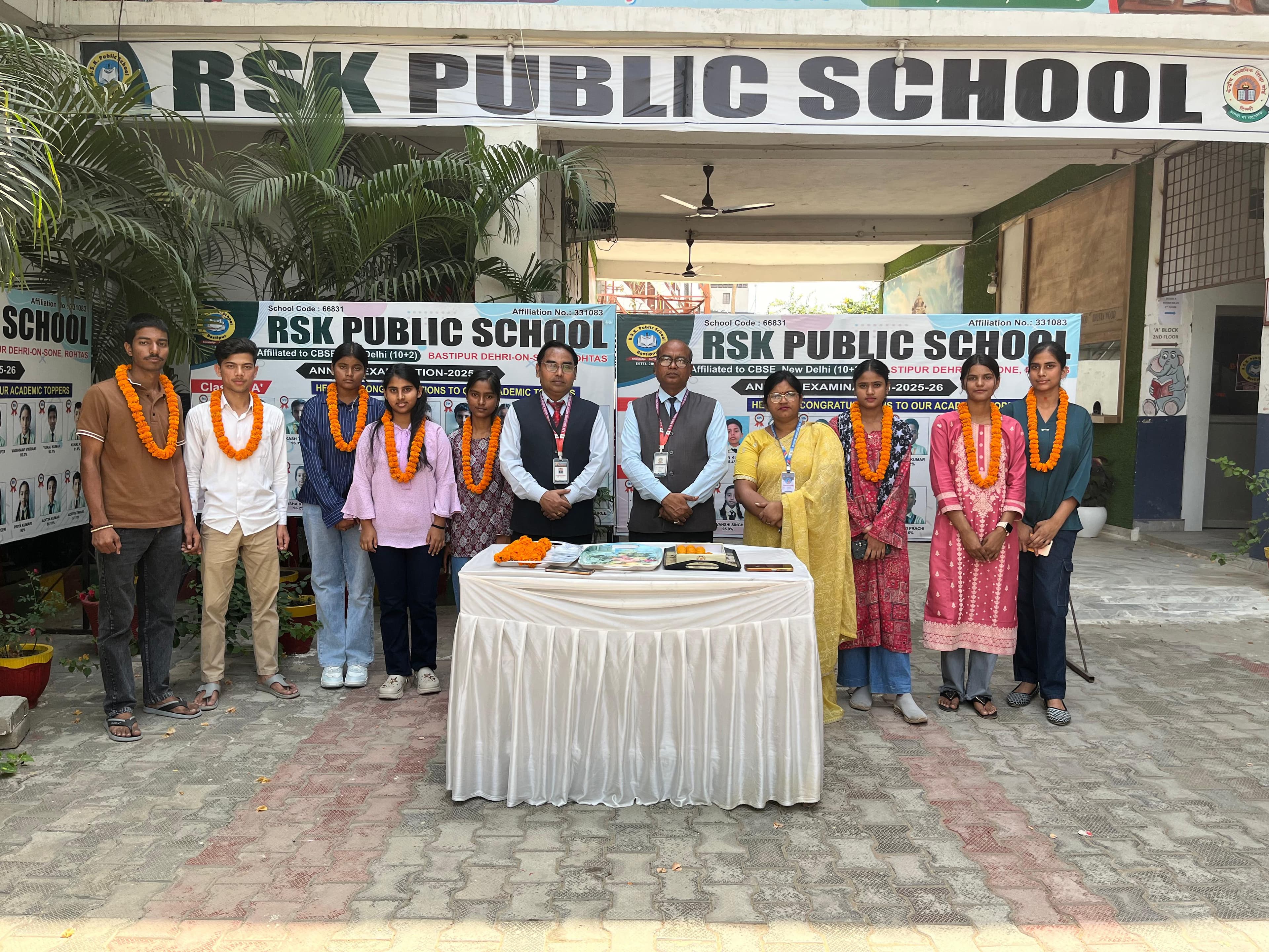 CBSE Board toppers and achievers with principal at RSK Public School celebration